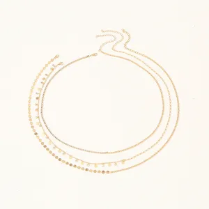 Stunning gold metal waist chain set featuring layered rhinestone and coin designs for women.