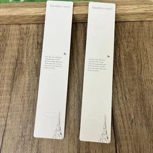 White jewelry display cards for long necklaces and bracelets, premium paper packaging.