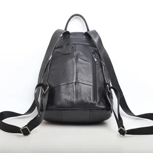 Genuine leather backpack for women, stylish black casual daypack with multiple compartments.