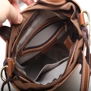 Leather canvas bucket bag interior design with zipper pocket and compartments for women.