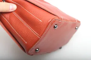 Genuine leather shoulder bag bottom detail view orange crossbody bag classic design style women