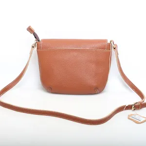 Genuine leather crossbody bag for women, classic brown shoulder bag with adjustable strap.