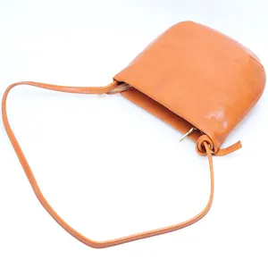 Retro minimalist vegetable tanned cowhide leather shoulder bag, stylish casual crossbody bag.