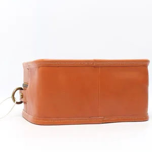 Vintage brown genuine leather cosmetic bag, minimalist dopp kit and versatile daily wash pouch.