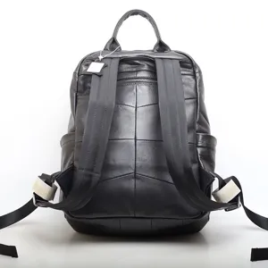 Black leather backpack for men, stylish multi-compartment business laptop school casual bag.
