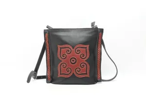 Vintage genuine leather shoulder cross body bag for women detailed view with retro flower pattern