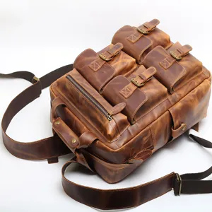 Vintage crazy horse leather backpack for men and women, multi-pocket travel daypack.