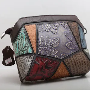 Genuine leather patchwork shoulder bag with embossed floral pattern for stylish women crossbody
