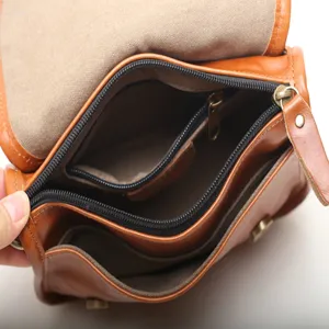 Vintage genuine leather messenger bag for women, retro brown crossbody shoulder bag.