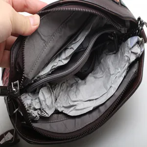 Genuine leather women shoulder bag, stylish color block design with practical inner pockets.
