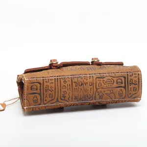 Vintage genuine leather cylinder handbag for women, retro embossed shoulder bag main view.