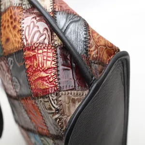 Vintage patchwork leather handbag, trendy color-block bucket shoulder bag for women.
