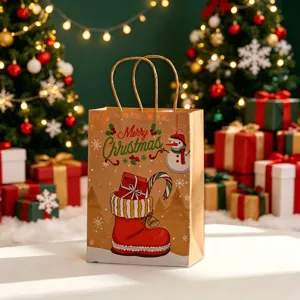 Detail view of festive Kraft paper gift bag with Merry Christmas snowman print