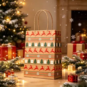 Detailed view of kraft paper Christmas gift bag featuring red reindeer and snowflake patterns