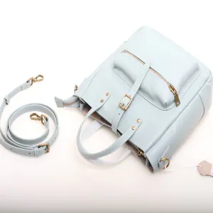 Light blue genuine leather convertible backpack and shoulder bag with multiple zippered pockets.