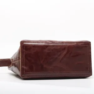 Brown vegetable-tanned leather women crossbody shoulder bag minimalist chic retro design.
