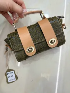 Vintage embossed leather handbag, genuine leather top-handle crossbody bag with turn-lock.