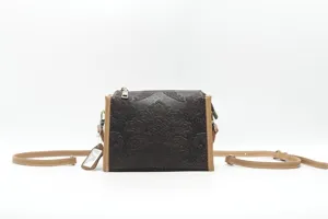 Vintage embossed genuine leather crossbody small square bag with stylish shoulder strap.