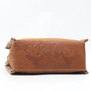 Retro genuine leather embossed shoulder handbag main view, stylish brown top-layer cowhide design.