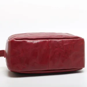 Red genuine leather vintage pillow bag crossbody shoulder bag for women daily commuting.