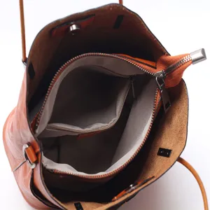 Vintage genuine leather bucket bag for women, orange handbag with zipper and shoulder strap.