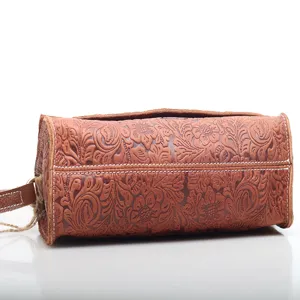 Vintage brown leather floral embossed cylindrical shoulder bag for women daily fashion style.