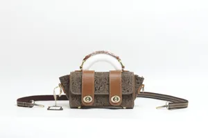 Genuine leather embossed top handle bag, retro style shoulder crossbody bag for women detail.