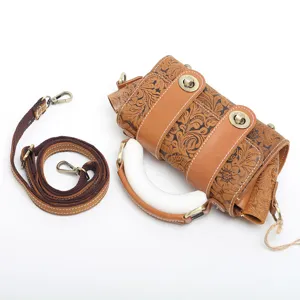 Vintage embossed genuine leather women handbag, stylish single shoulder crossbody bag with strap.