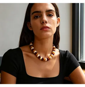 Elegant geometric disc bead necklace for women, stylish multi-color handmade fashion jewelry.
