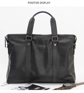 Classic black leather business briefcase for men, spacious commuting handbag with durable handles.