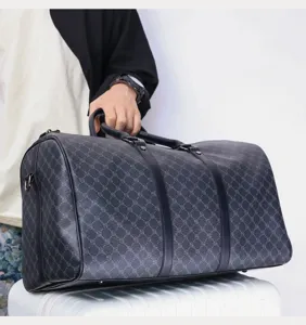 Men large capacity travel duffel bag vintage monogram leather handbag details view