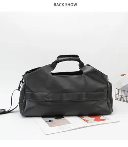 Black large capacity travel duffel bag detail view, casual leather gym handbag for boarding.