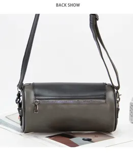 Detailed view of men's cylindrical crossbody shoulder bag, stylish casual street style.