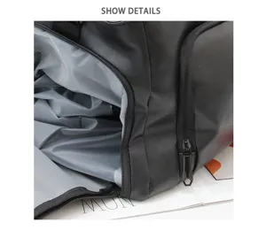 Detailed view of black travel duffel bag interior lining, dry wet separation design.