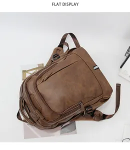 Detailed view of the retro brown PU leather backpack showcasing multi-pocket zipper compartments.