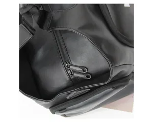 Black waterproof travel gym bag detail close-up, large capacity duffel for daily fitness.