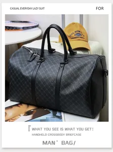 Detail view of men's travel duffel bag in dark gray grid pattern with sturdy black leather handles.