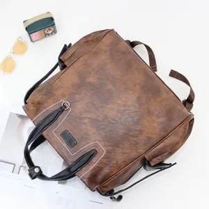 Sac à dos vintage en similicuir marron décontracté multifonctionnel élégant pour hommes