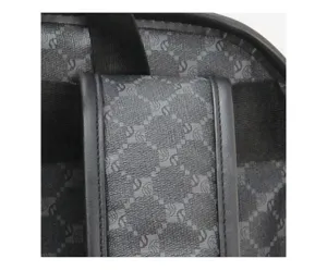 Men's fashion business backpack detail view featuring durable monogram printed fabric design.