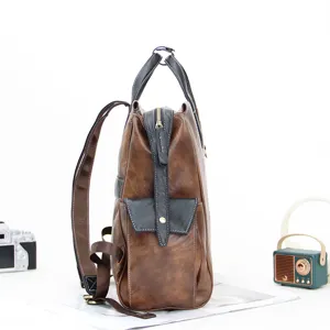 Sac à dos en cuir marron vintage, sac à dos décontracté multifonctionnel pour voyage urbain.
