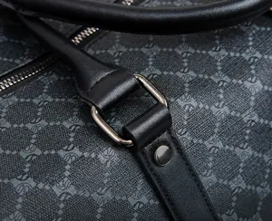 Men's travel bag hardware detail showing the sturdy hook and buckle connection clearly.