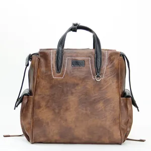 Sac à dos marron rétro multifonctionnel vintage pour homme, cartable et sac ordinateur urbain.