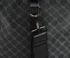 Detailed close-up shot of men's travel bag metal buckle strap hardware component design.