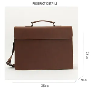 Detailed view of the vintage brown leather briefcase showing texture, handle and dimensions.