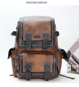 Vintage large capacity leather backpack for men, retro brown school computer travel bag.