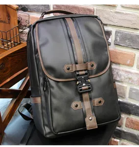 Detail view of the vintage men casual backpack with contrast brown leather straps and buckle.