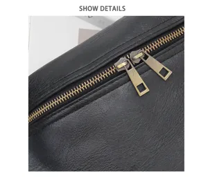 Close-up detail of men's casual chest bag, durable black leather with metal double zippers.