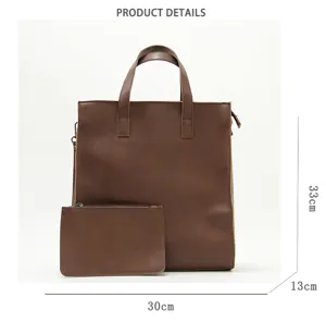 Sac cabas d'affaires en cuir marron pour hommes avec petite pochette, vue de détail style.