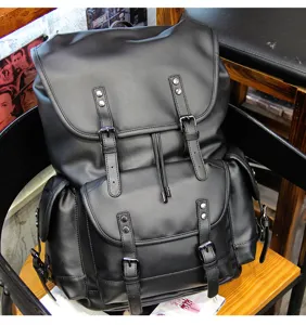 Vintage black leather backpack for men, large capacity casual travel school book bag.