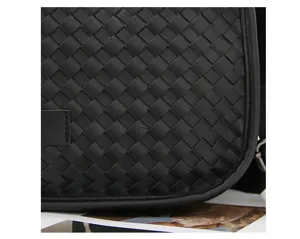 Black woven messenger bag for men, stylish casual shoulder bag with classic texture.